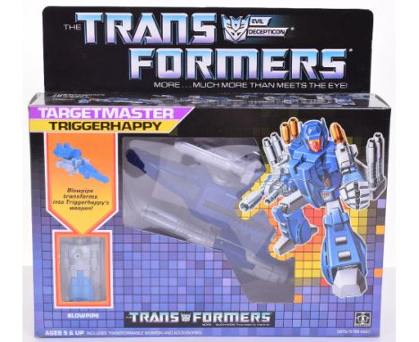 Boxed Hasbro G1 Transformers Target Master Triggerhappy 1986 issue, transforms from jet to robot and back in mint boxed compl