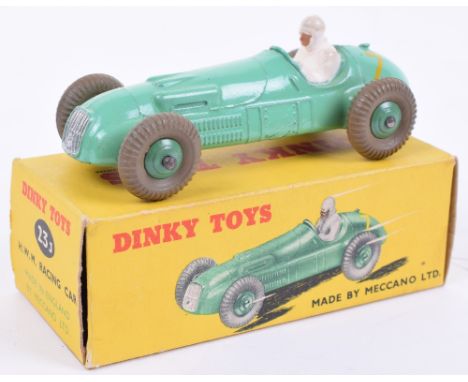 Dinky Toys 23J H.W.M. Racing Car,light green body, wheel hubs, white driver , racing no 7, in near mint condition, with a exc