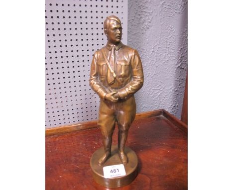 A BRASS MODEL OF AN OFFICER