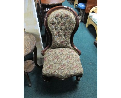 A VICTORIAN MAHOGANY LADIES CHAIR the curved top rail above a button upholstered back and seat on cabriole legs