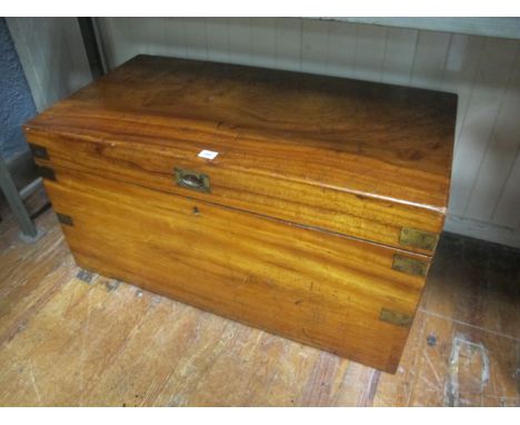A CAMFERWOOD TRUNK with a brass inset handle and straps 55cm (h) x 107cm (w) x 56cm (d)