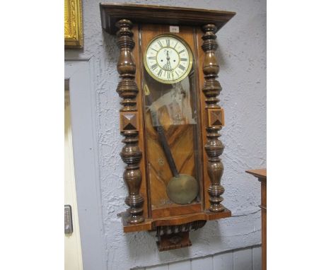 A GOOD VICTORIAN WALNUT CASE VIENNA REGULATOR CLOCK with painted circular enamel dial and turned pilasters 