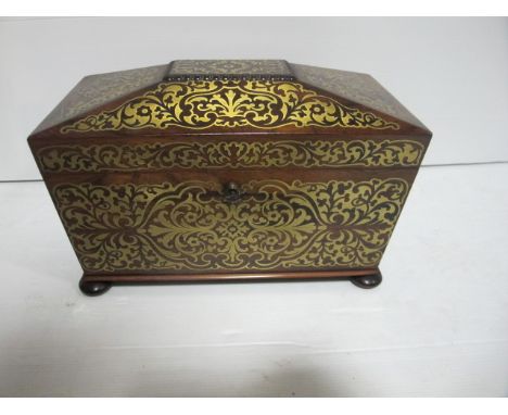 A GOOD REGENCY ROSEWOOD TEA CADDY the domed top enclosing two caddies