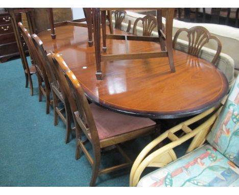 A REGENCY STYLE MAHOGANY D-END DINING TABLE raised on twin tripod supports with one loose leaf 74cm (h) x 216cm (w) x 96cm (d