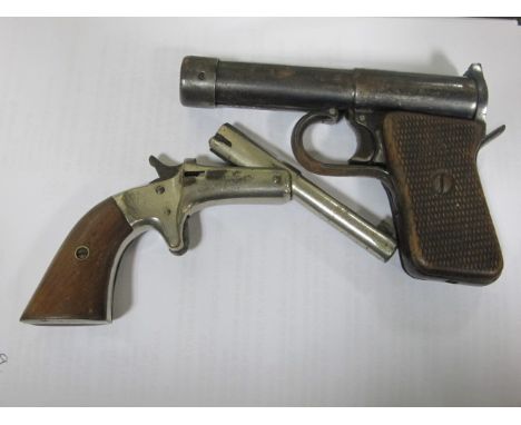 AN AIR PISTOL together with a ladies handgun (2)