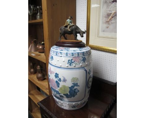 A CHINESE DECORATED POTTERY CONSERVATORY SEAT together with a ladies beaver fur coat and a Chinese model of a water buffalo w