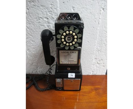 A BAKELITE MODEL OF AN EARLY AMERICAN CALL PHONE