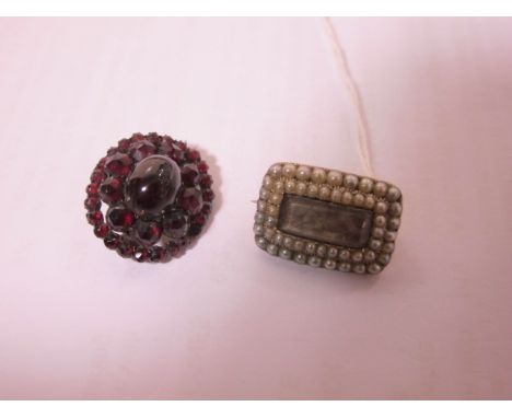 A VICTORIAN GOLD AND PEARL MEMORY BROOCH together with a ruby bar brooch (2)