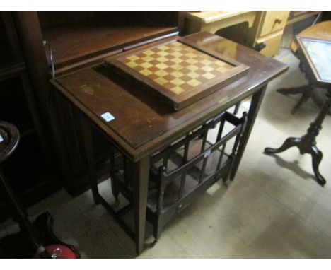 A TEAK RECTANGULAR OCCASIONAL TABLE together with a chess board, a mahogany d-shaped occasional table and a Canterbury