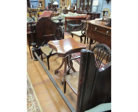 A VICTORIAN MAHOGANY SINGLE BED of unusual form with bow shaped headboard and carved uprights