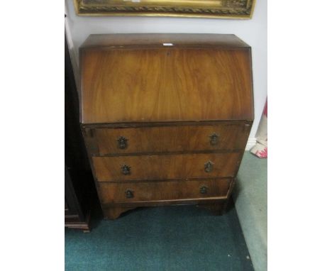 A WALNUT BUREAU containing three frieze drawers on bracket feet 100cm (h) x 76cm (w) x 44cm (d)