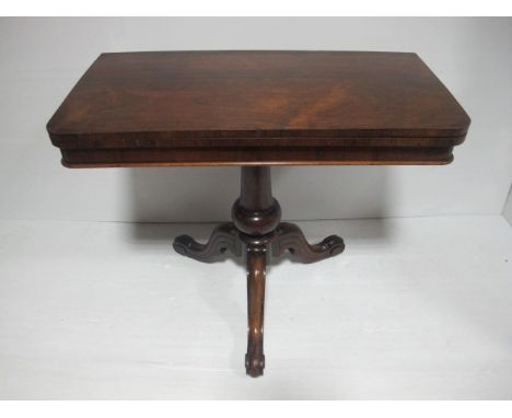 A GOOD REGENCY ROSEWOOD CARD TABLE on pillar support with outswept legs