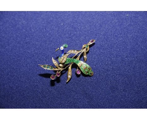 Circa 1900 18ct Emerald, Ruby and Pearl brooch in the form of a peacock in naturalistic setting with bar fitting 