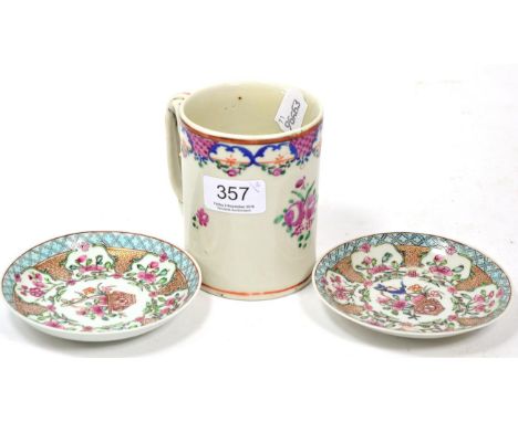 An 18th century Chinese porcelain mug and a pair of Chinese porcelain saucers circa 1730
