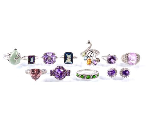 Three silver amethyst rings; a pair of silver amethyst stud earrings; a silver jade ring and six other silver gem-set rings (