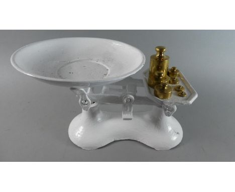 A White Painted Set of Metal Kitchen Scales with Brass Weights 