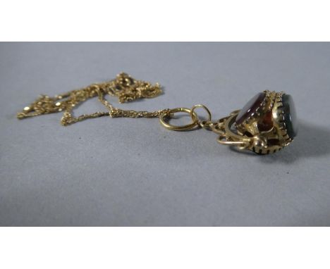 A 9 Carat Gold Chain with Swivel Triple Fob. Total Gross Weight - 3.5gms 
