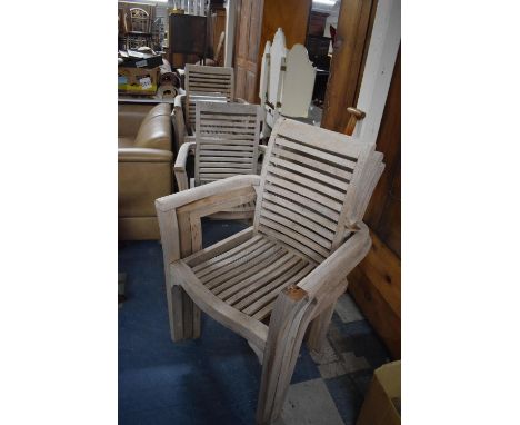 A Set of Eight Wooden Garden or Patio Chairs (One Missing Arm) 