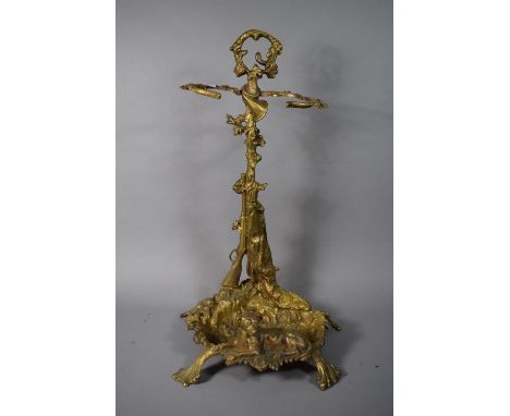 A Brass Stick Stand with Sporting Theme to include Shotgun, Retriever and Game, 56cm High 