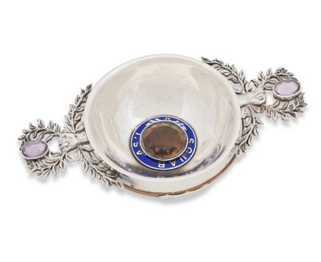 A Victorian walnut, silver and enamel and gem-set quaichUnmarked, circa 1869 The walnut bowl mounted in silver and with a cit