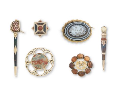 A collection of broochesTo include: a Scottish broadsword brooch set with bloodstone and jasper, 73mm long; a Scottish dagger