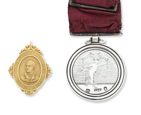 A silver Edinburgh Skating Club medal and a 15ct gold Glasgow Haggis Club medalThe first: Depicting to one side a winged cher