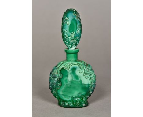 An Art Deco malachite glass scent bottleWith scrolling foliate decoration.  15.5 cm high.    CONDITION REPORTS:  Generally in