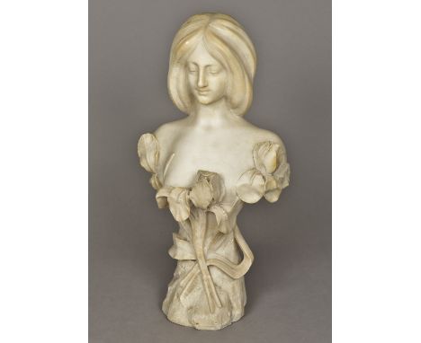 An Art Nouveau marble bustCarved as a young lady amongst floral sprays.  55 cm high.    CONDITION REPORTS:  Some cracks and c