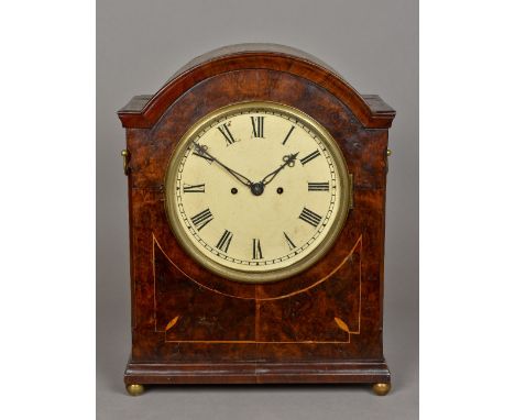 A 19th century burr walnut cased twin fusee bracket clockThe white painted dial with Roman numerals and bell striking three p