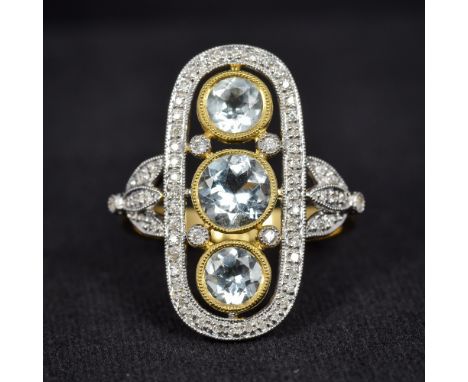 An Art Deco style 18K gold, diamond and aquamarine ringOf pierced rounded rectangular form, centred with three facet cut aqua