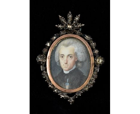 A 19th century miniature portrait, possibly MozartMounted in a diamond set pendant frame.  5 cm high overall.    CONDITION RE