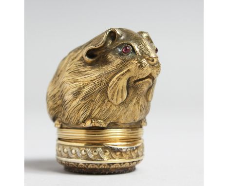 A SUPERB RUSSIAN SILVER GILT HAMSTER SNUFF BOX set with diamonds and inset coins. Maker J P. 84 head. 5ins in a Faberge box.