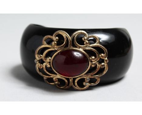 LUCAS JACK. A BANGLE.