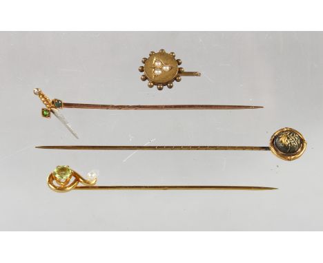 FOUR VARIOUS EDWARDIAN TIE PINS.