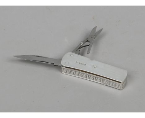 A Joseph Rodgers silver combination snuff box and multi tool pocket knife. Decorated with a Greek key design. Assayed Sheffie