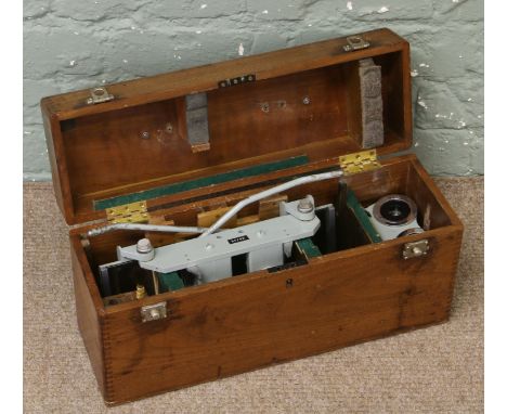 A vintage mahogany cased type SV3 CFC aviation stereo scope, made in England by Casello of London