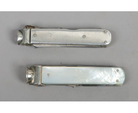 Two multi tool folding smokers knives. One sterling silver and one with mother of pearl scales. 