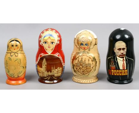 Four painted Russian dolls one with a portrait of Vladamir Putin and George Bush.
