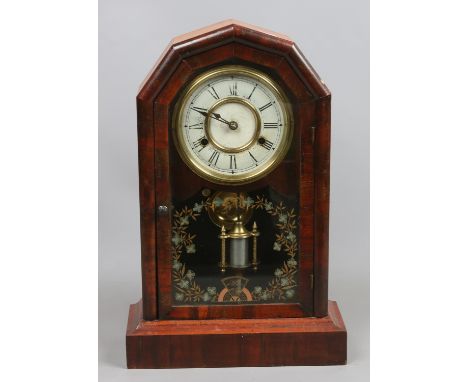 An American walnut cased eight day mantle clock
