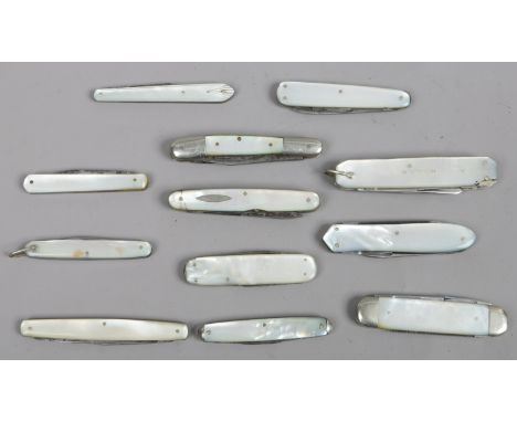 Twelve folding pocket knives with mother of pearl scales.
