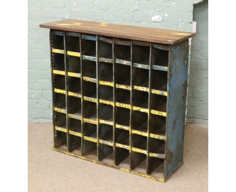 An upcycled industrial style wine rack.