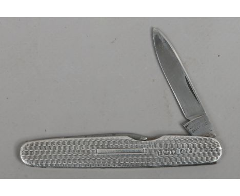 A silver engine turned multi blade pocket knife by J. H. Potter. Assayed Sheffield 1933.