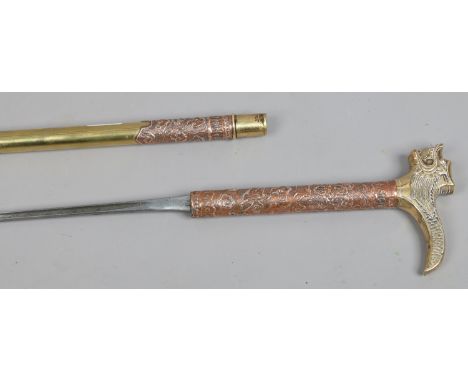 A brass and copper sword stick, the fluted blade engraved made in England Wilkinson sword, decorated to the body in oriental 