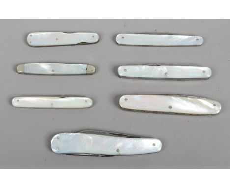 Seven multi blade folding pocket knives with mother of pearl scales including one example by Joseph Rodgers with worked back.