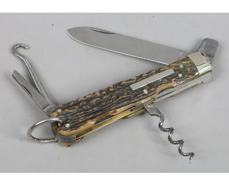 A fine Edwardian sportsman's knife with antler scales by Underwood. With locking blade, six additional blades and four pull o