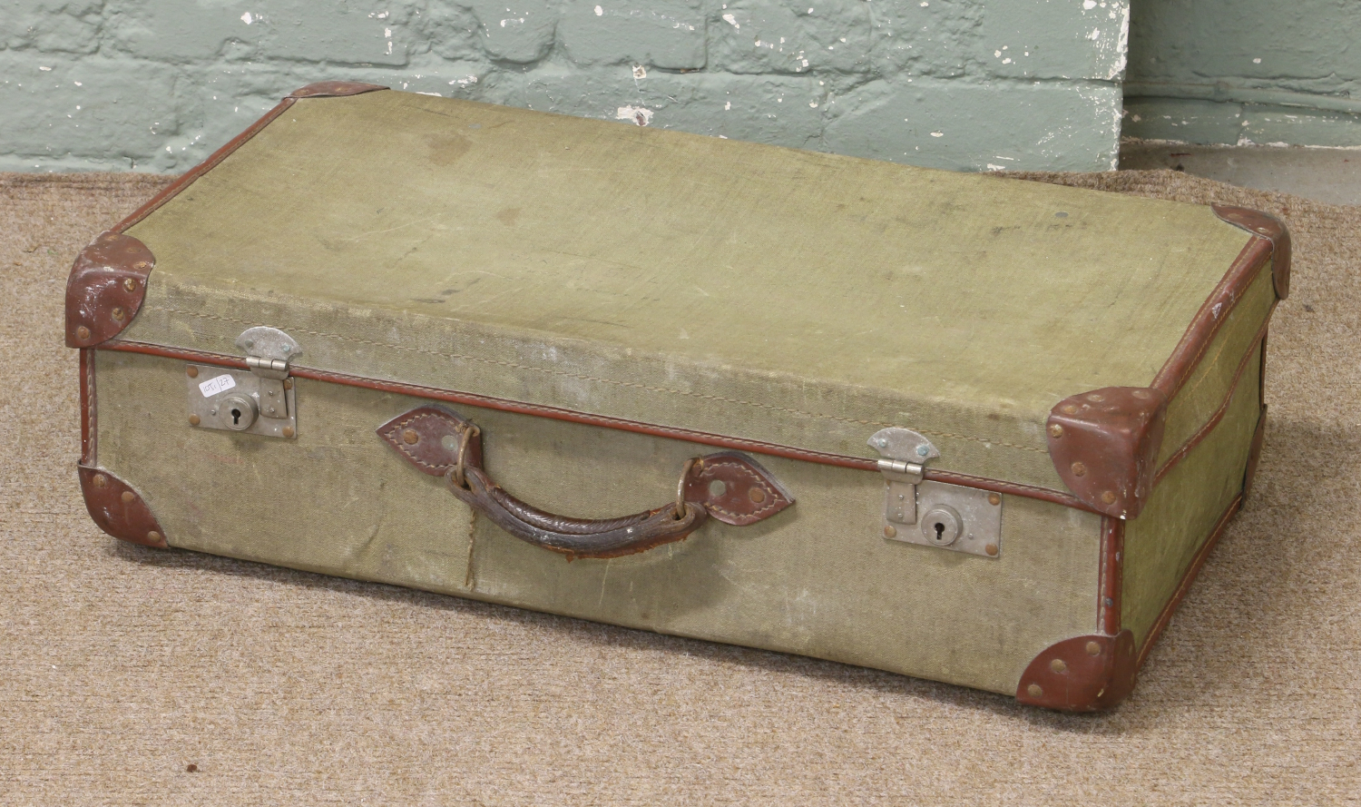 A leather mounted British Army suitcase.