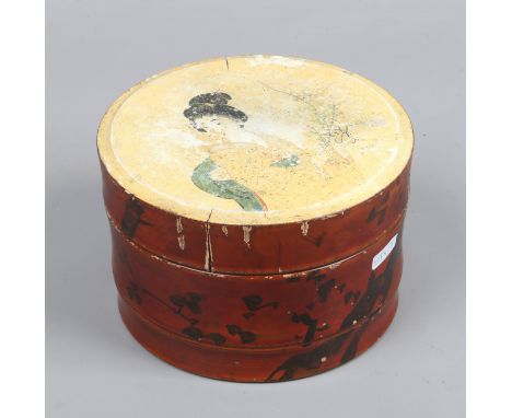 A Japanese faux bamboo lacquered bento box, painted with the portrait of a Geisha.