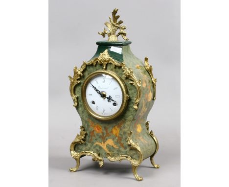 A French style bracket clock with green and gilt decoration.