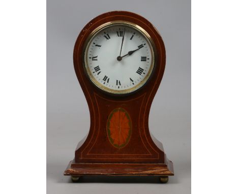 An Edwardian mahogany balloon mantle clock.