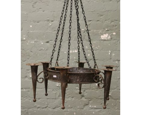A wrought iron six branch hanging lamp.